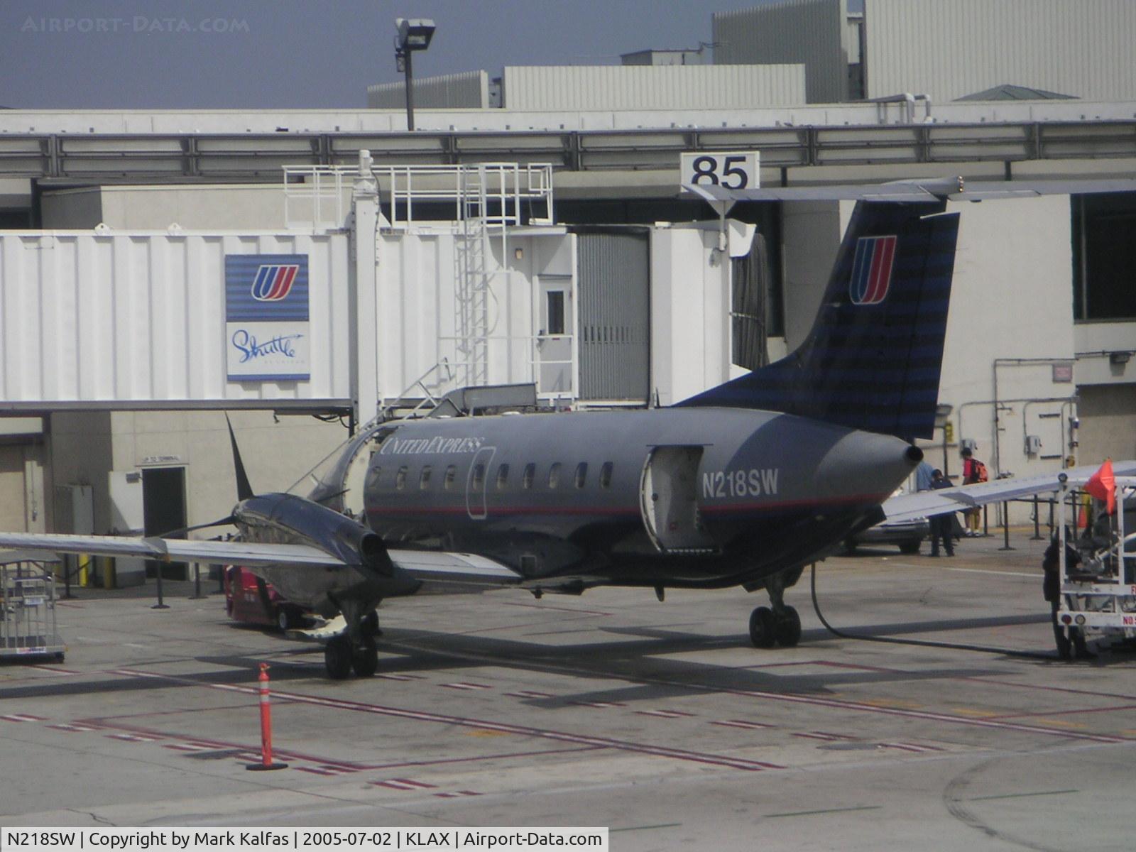 N218SW, 1994 Embraer EMB-120ER Brasilia C/N 120.287, SkyWest Embraer EMB-120ER, N218SW at gate 85 KLAX.