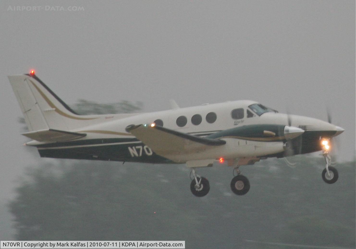 N70VR, 2001 Raytheon Aircraft Company C90A C/N LJ1651, BA JACOBS FLIGHT SERVICES Raytheon Aircraft Company C90A King Air, departing 20R KDPA in heavy rain en-route to KPCZ.