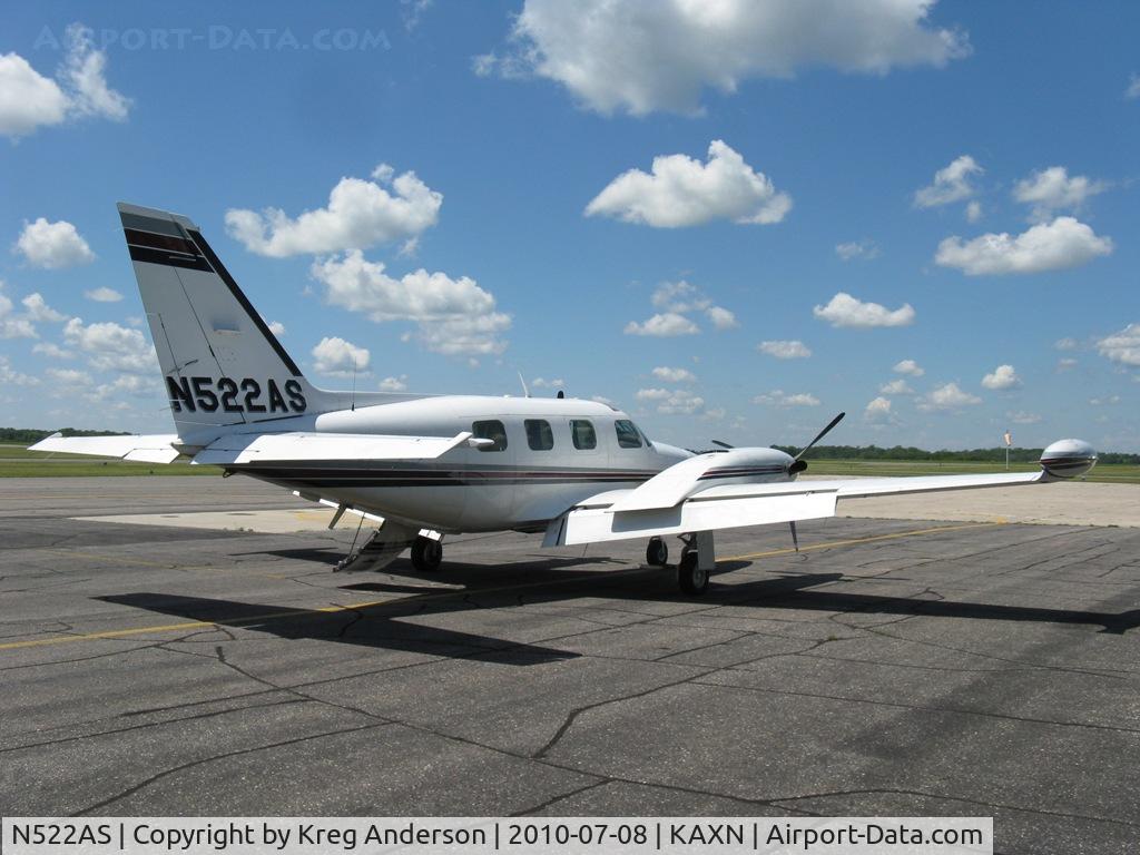 N522AS, 1975 Piper PA-31T C/N 31T-7520007, Piper PA-31T Cheyenne by the terminal.