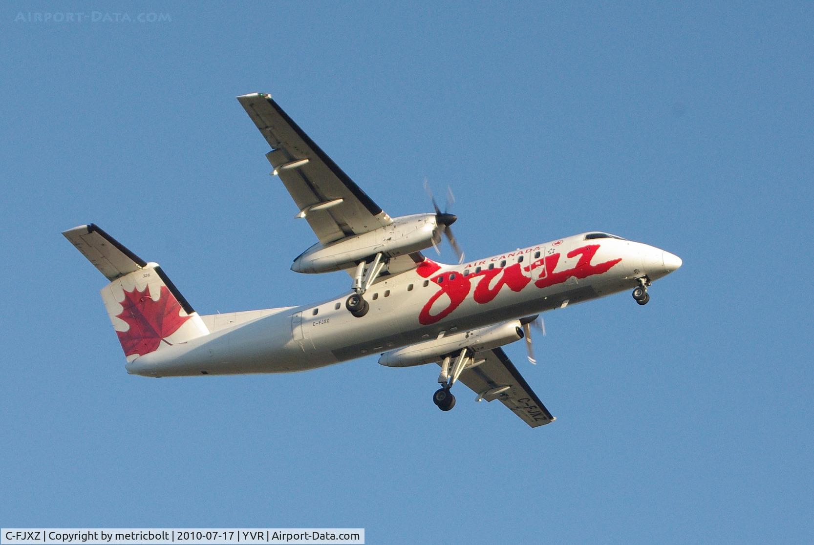 C-FJXZ, 1991 De Havilland Canada DHC-8-311 Dash 8 C/N 264, landing at YVR