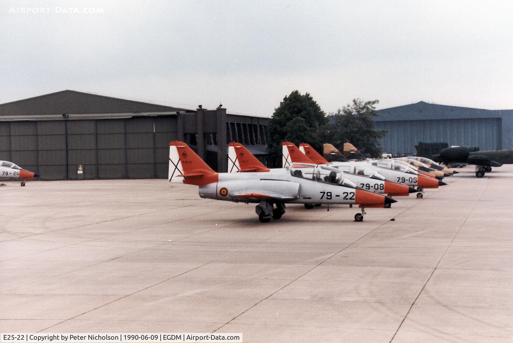 E25-22, CASA C-101EB Aviojet C/N EB01-22-022, CASA C-101EB with others of the Spanish Air Force display team on the flight-line at the 1990 Boscombe Down Battle of Britain 50th Anniversary Airshow.