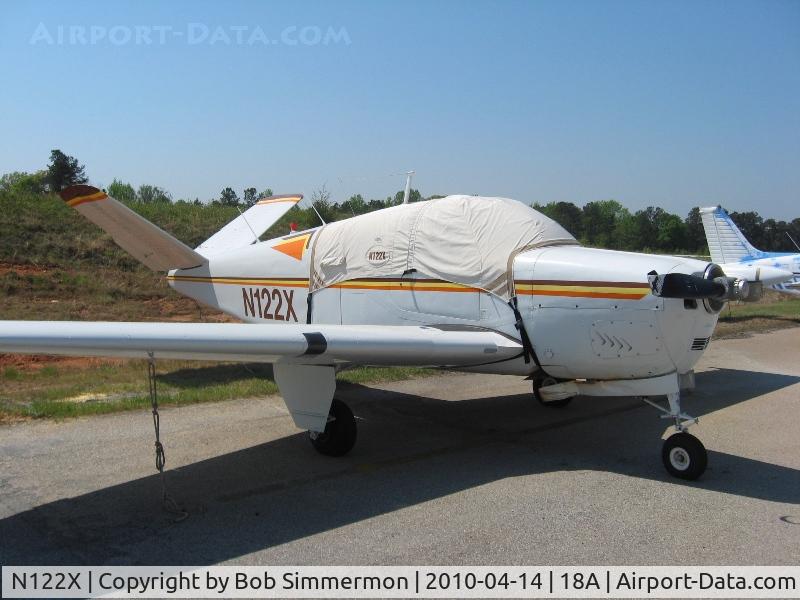 N122X, 1958 Beech M35 Bonanza C/N D-6412, On the ramp at Canon, GA with a few scrapes and bumps.