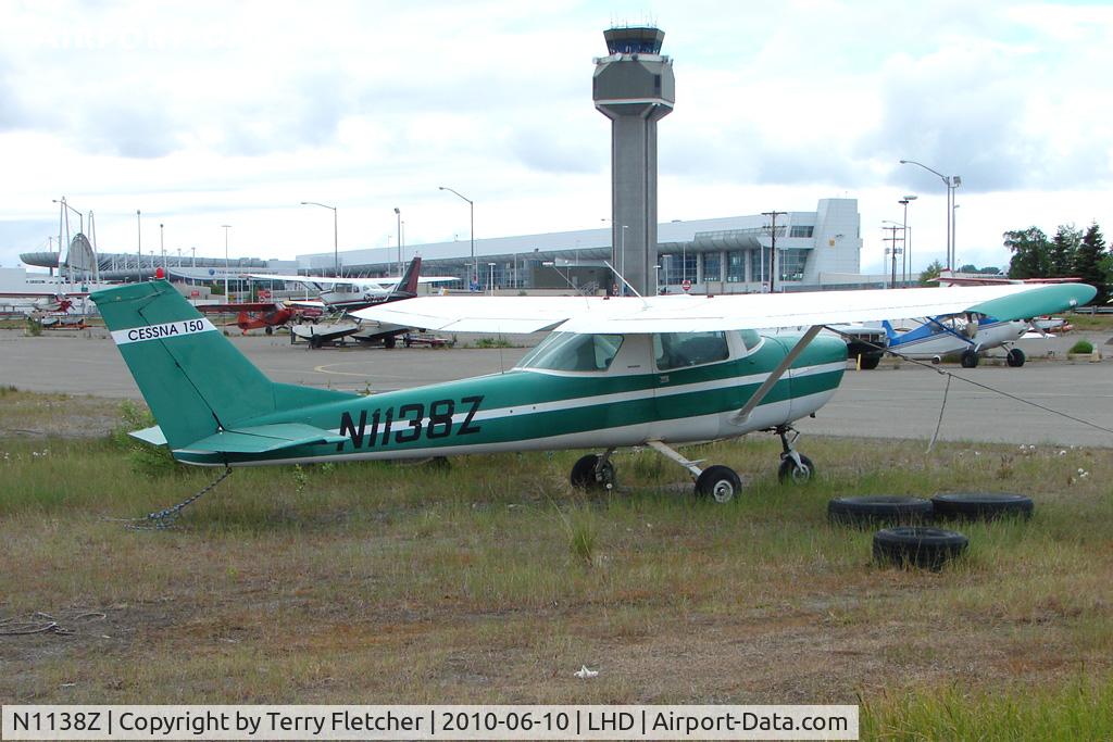N1138Z, 1969 Cessna 150J C/N 15069760, 1969 Cessna 150J, c/n: 15069760 at Lake hood with ANC Control Tower in background