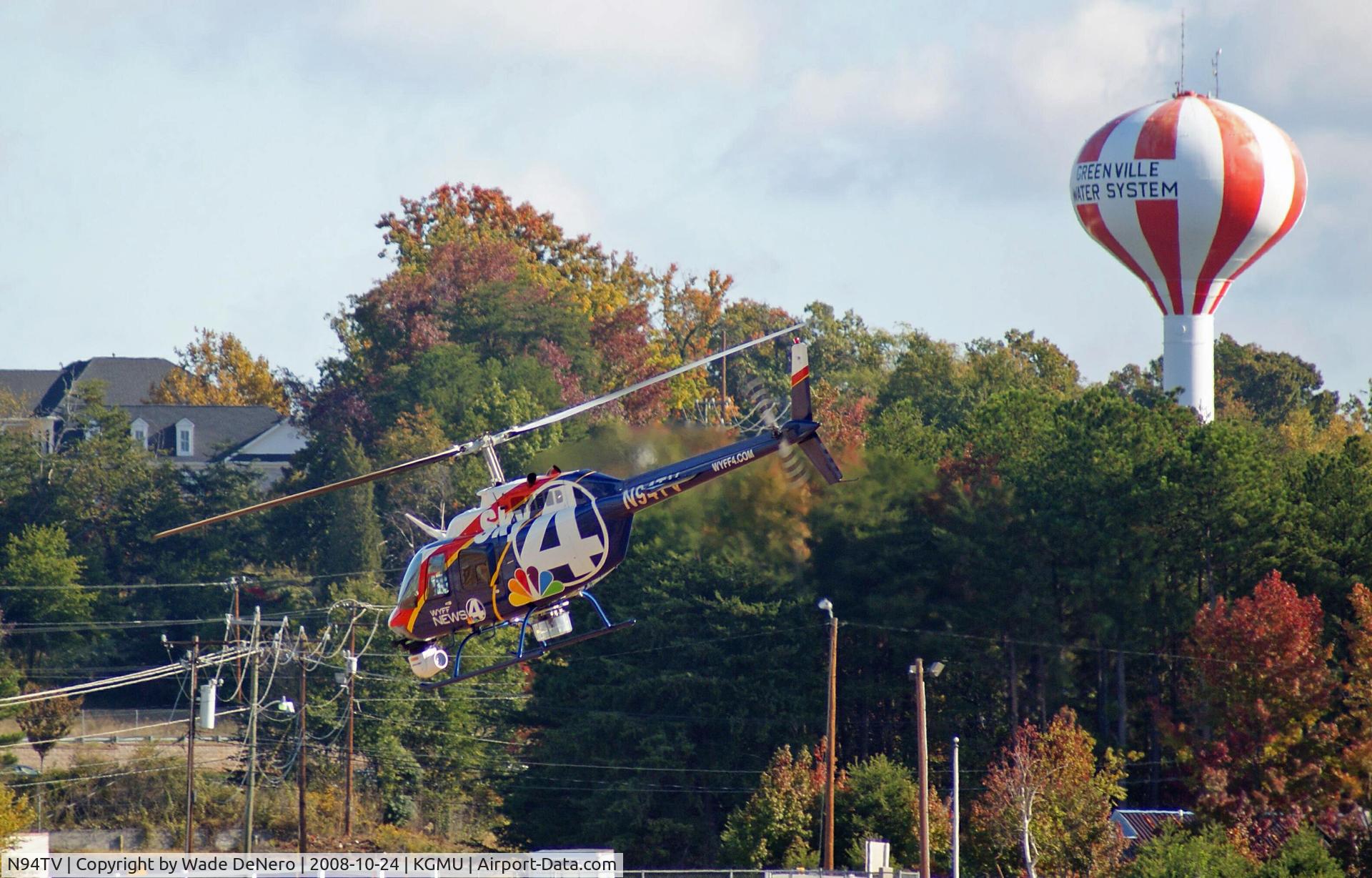 N94TV, 2000 Bell 206B C/N 4530, Taking off from the downtown airport.