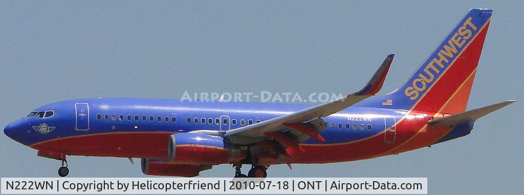 N222WN, 2005 Boeing 737-7H4 C/N 34290, On final to 26R and wearing the new Southwest's latest nose art - 
