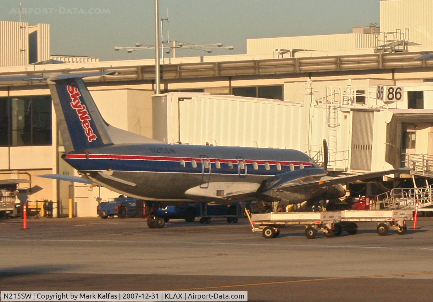 N215SW, 1993 Embraer EMB-120ER Brasilia C/N 120.281, SkyWest  Embraer EMB-120ER, N215SW at gate 86 KLAX.