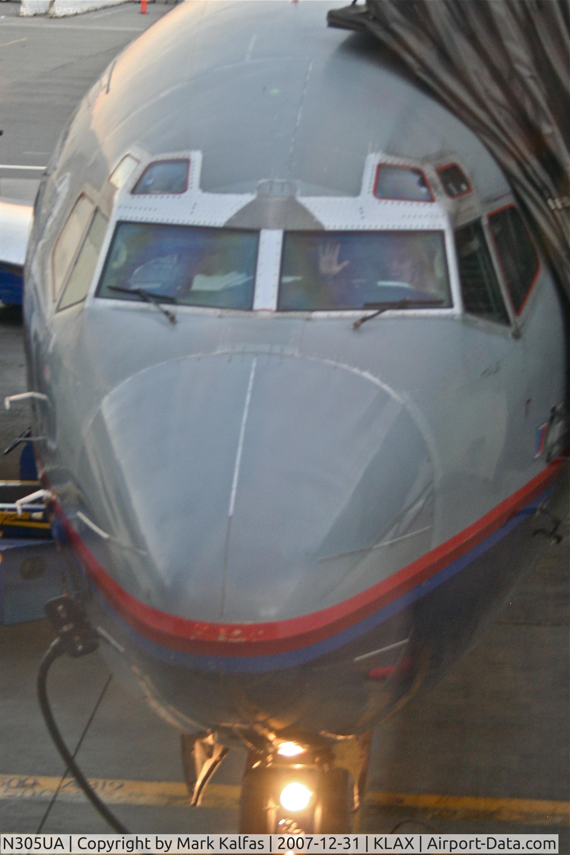 N305UA, 1987 Boeing 737-322 C/N 23666, United Airlines Boeing 737-322, N305UA pushing back gate 70A KLAX headed for KSFO.