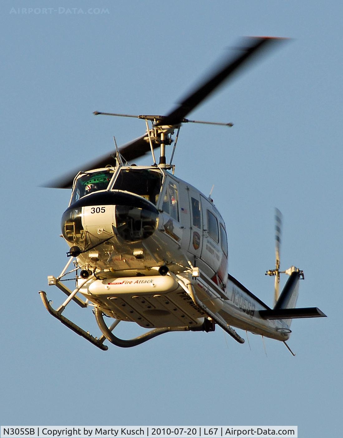 N305SB, 1969 Bell UH-1H-BF Iroquois C/N 11527, Final approach to Sheriff's ramp.