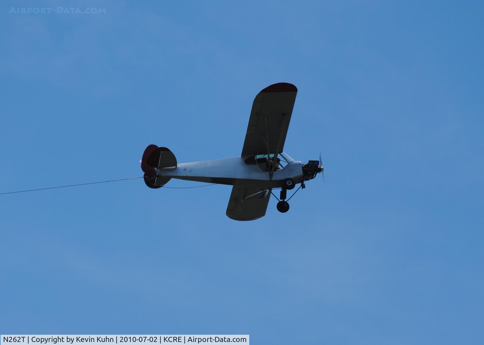 N262T, 1953 Piper PA-18-105 Special C/N 18-2376, Sign tug coming in