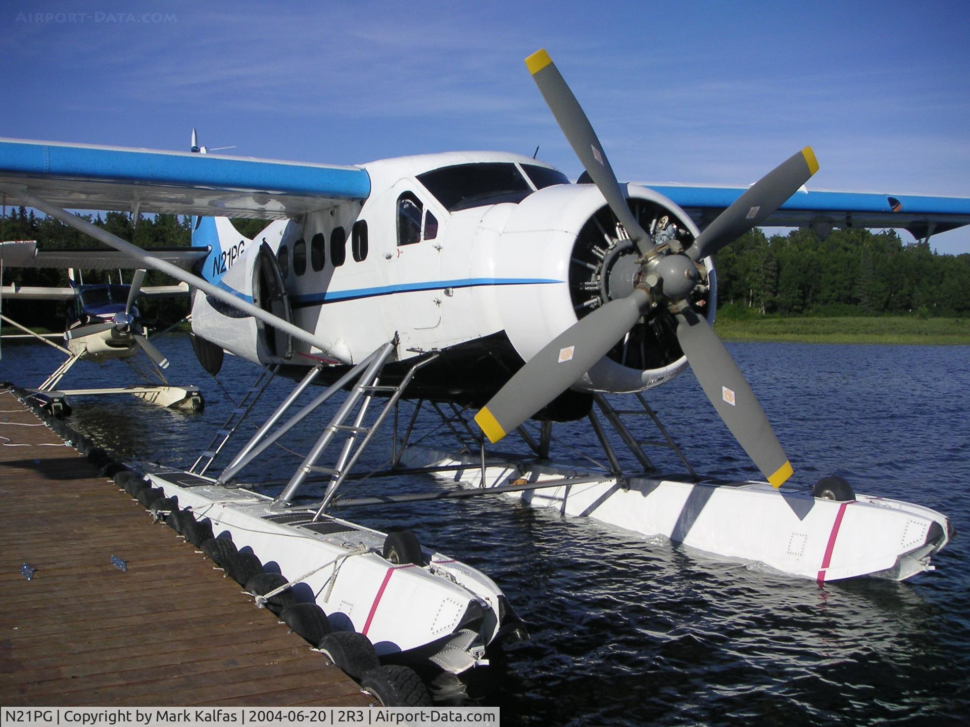 N21PG, 1958 De Havilland Canada U-1A Otter (DHC-3) C/N 310, Alaska West Air Dehavilland DHC-3, N21PG docked at 2R3 (Island Lake-Kenai, AK).