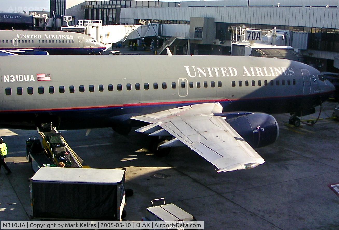 N310UA, 1987 Boeing 737-322 C/N 23671, United Airlines Boeing 737-322, N310UA at gate 70A KLAX.