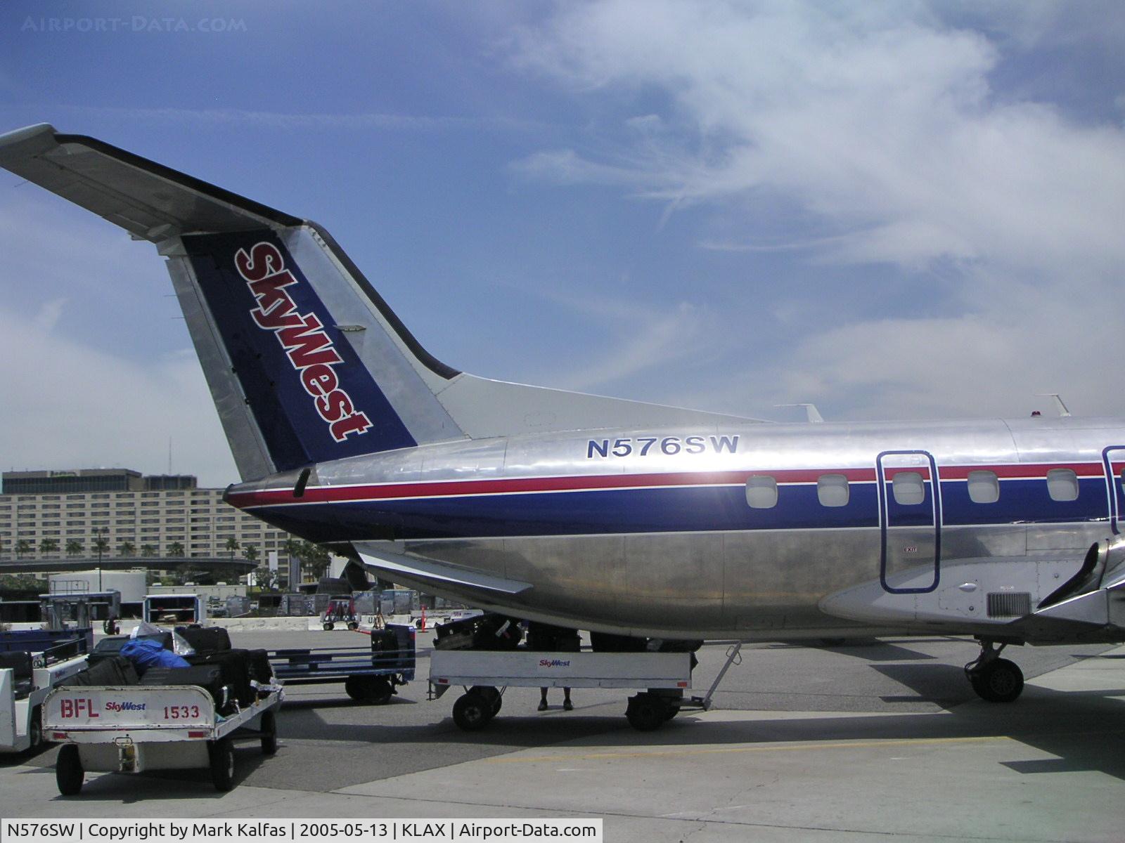 N576SW, 1998 Embraer EMB-120ER Brasilia C/N 120345, SkyWest Embraer EMB-120ER, N576SW at the remote ramp KLAX.