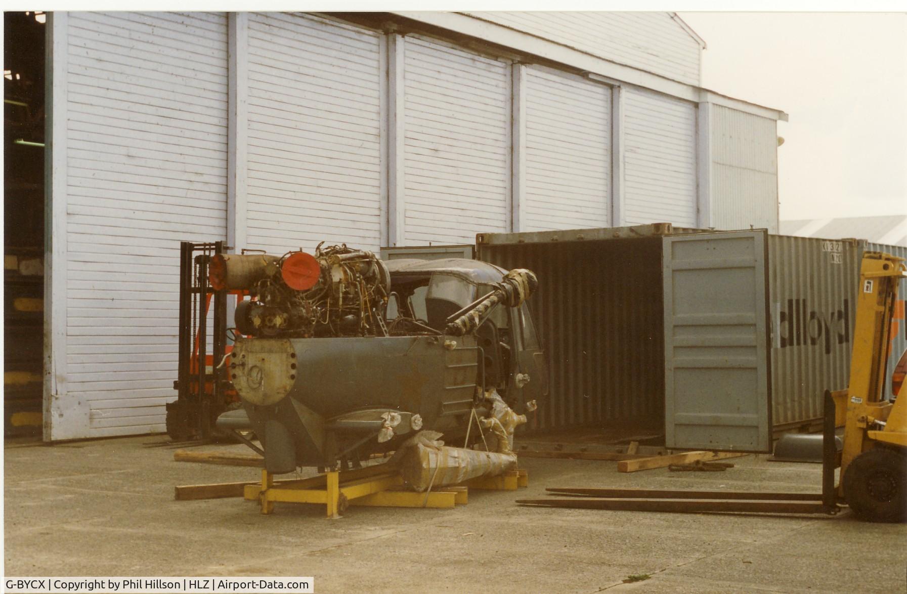 G-BYCX, 1973 Westland WASP MK1B C/N F9754, Unloading from the container for South Africa