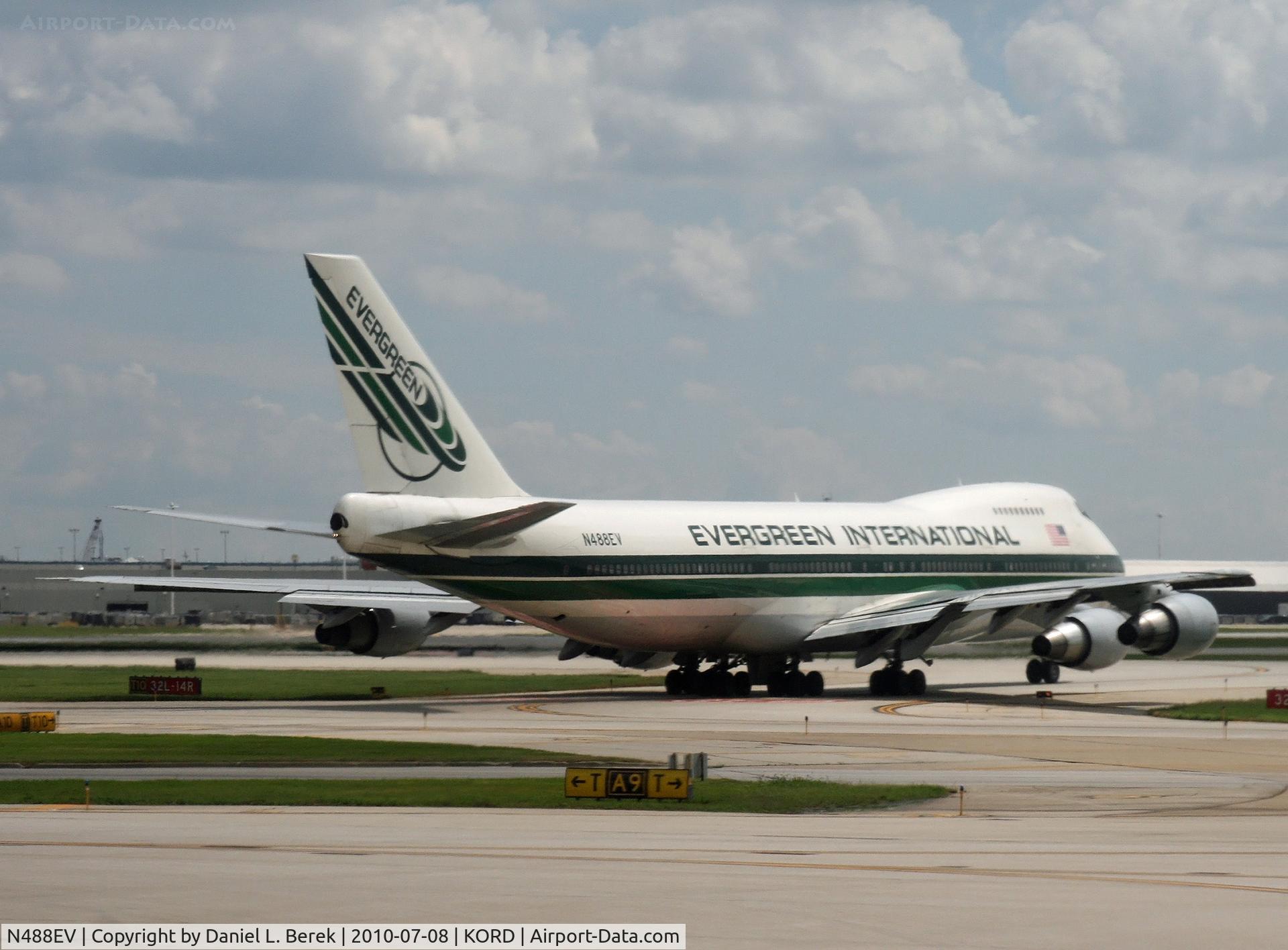 N488EV, 1985 Boeing 747-230BF C/N 23287, Built in 1985, this Jumbo served Lufthansa for 20 years, registered D-ABZA.  The well-maintained plane got a new lease on life as a freight dog for Evergreen; she is seen in June 2010 at O'Hare, taxying for takeoff.