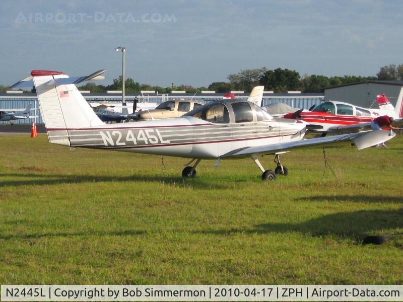 N2445L, 1979 Piper PA-38-112 Tomahawk C/N 38-79A0704, Tied down in the grass at Zephyrhills, Florida during Sun N Fun week.