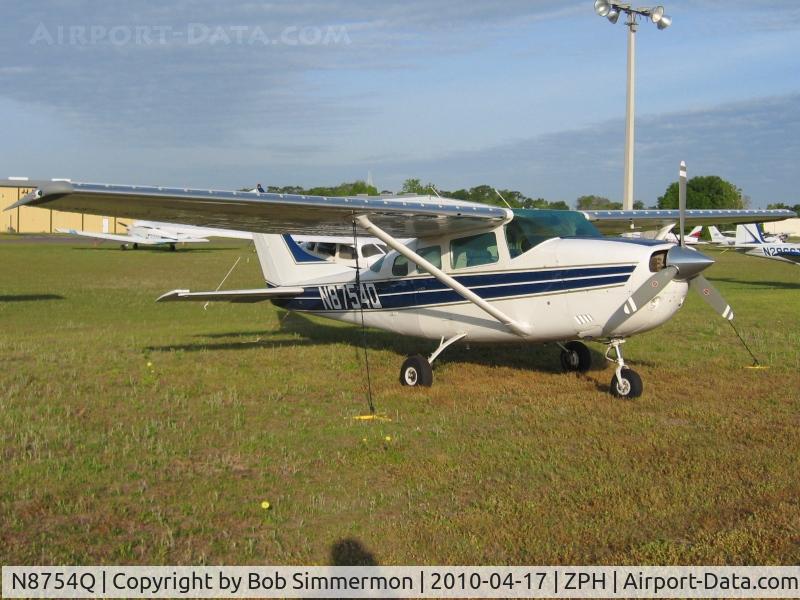 N8754Q, 1976 Cessna U206F Stationair C/N U20603507, Tied down in the grass at Zephyrhills, Florida during Sun N Fun week.