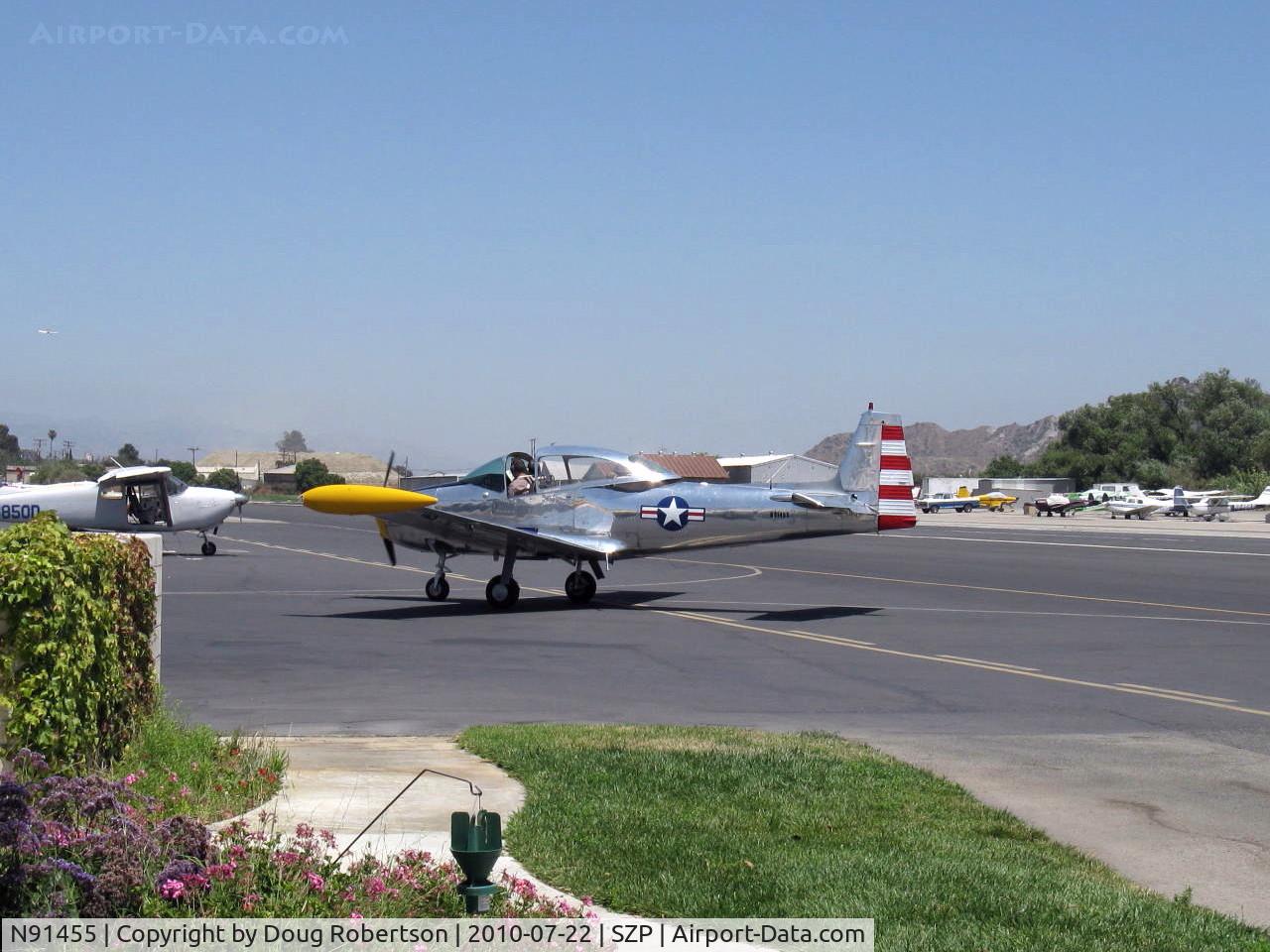 N91455, 1946 North American Navion C/N NAV-4-100, 1946 North American NAVION, Continental E185 listed, cowl mods and three-blade prop suggest engine upgrade, taxi