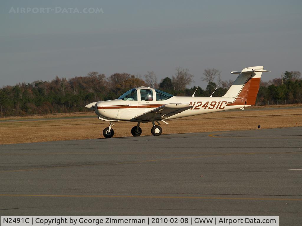 N2491C, 1978 Piper PA-38-112 Tomahawk C/N 38-79A0203, Taxing back to homebase hangar @ Goldsboro-Wayne after touch-n-go flight practice