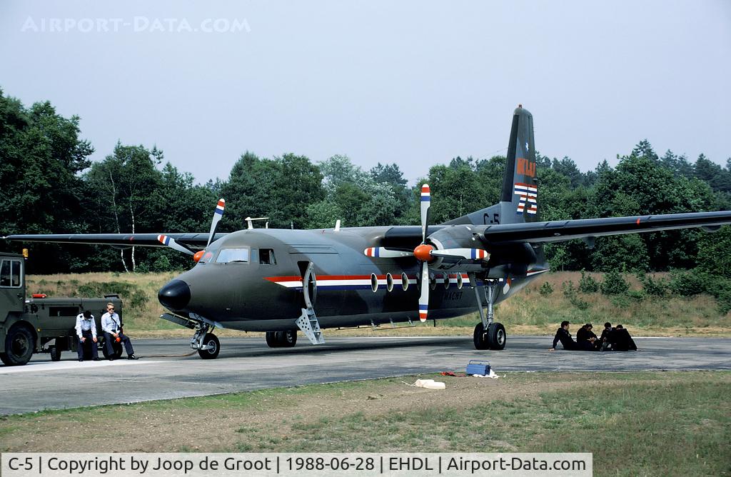 C-5, 1960 Fokker F-27-300M Troopship C/N 10155, In 1988 the Dutch Air Forces celebrated its 75th anniversary at Deelen AB. For 5 days the base was open for the public. The crew of the F-27 display is resting after yet another performance.