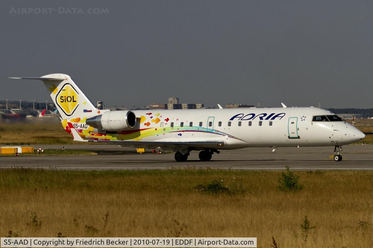 S5-AAD, 1997 Canadair CRJ-200LR (CL-600-2B19) C/N 7166, departing via RW18W