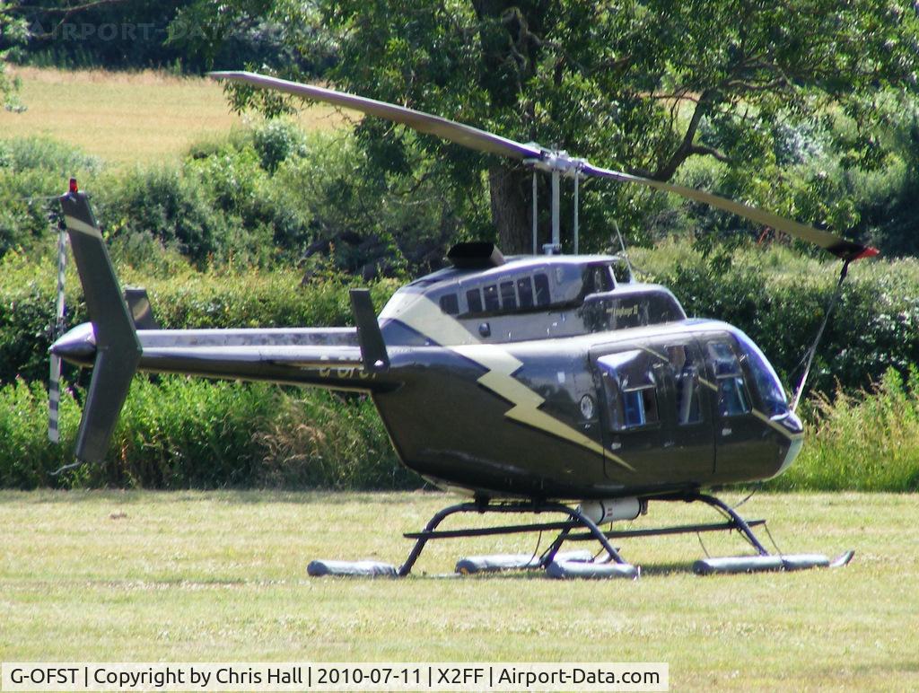 G-OFST, 1989 Bell 206L-3 LongRanger III C/N 51300, Bell 206 Jet Ranger used for ferrying race fans to Silverstone for the British Grand Prix from this temporary heliport a few miles east of Bicester