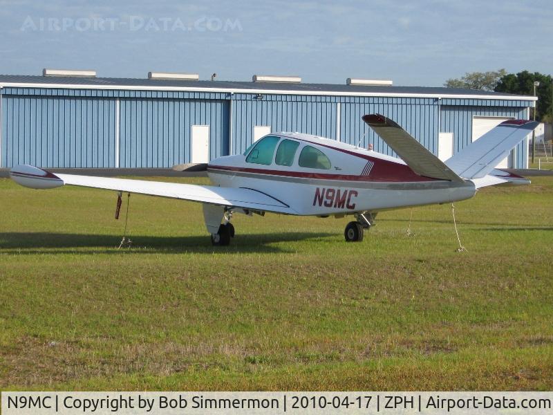 N9MC, 1963 Beech P35 Bonanza C/N D-7271, Tied down in the grass at Zephyrhills, Florida.