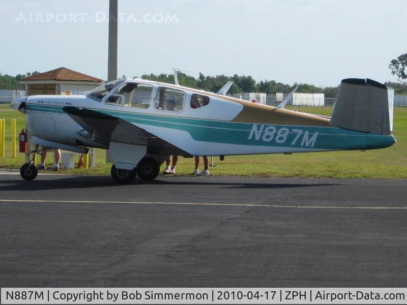 N887M, 1956 Beech G35 Bonanza C/N D-4747, On the ramp at Zephyrhills, Florida during Sun N Fun week