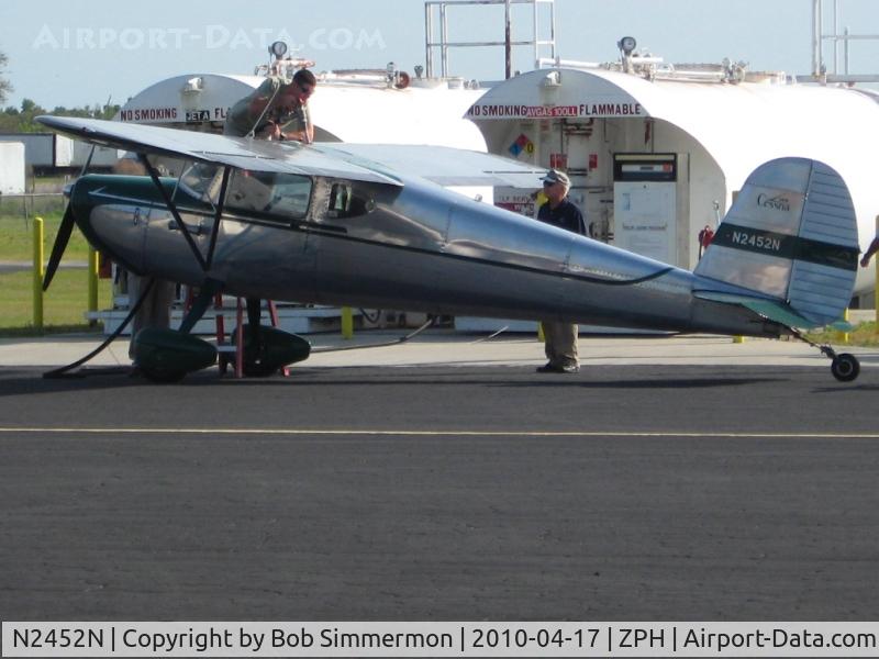 N2452N, 1947 Cessna 140 C/N 12705, Fueling at Zephyrhills, Florida during Sun N Fun week