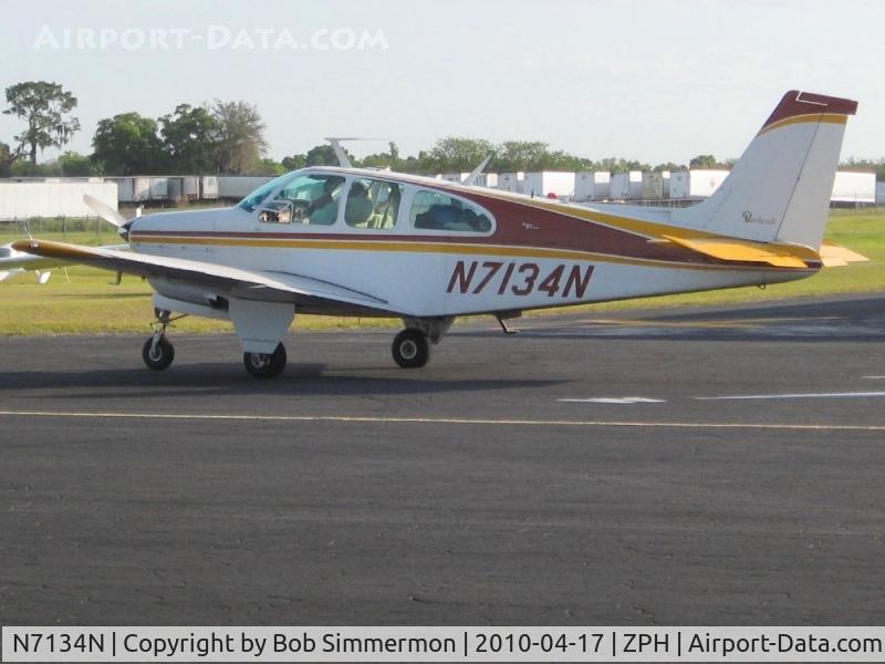 N7134N, 1967 Beech E33 Bonanza C/N CD-1138, On the ramp at Zephyrhills, Florida during Sun N Fun week