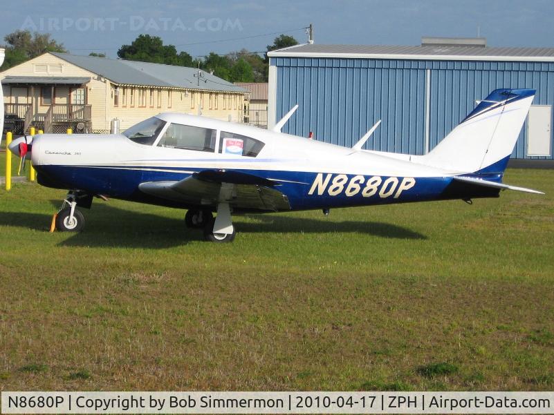N8680P, 1965 Piper PA-24-260 Comanche C/N 24-4128, On the ramp at Zephyrhills, Florida during Sun N Fun week