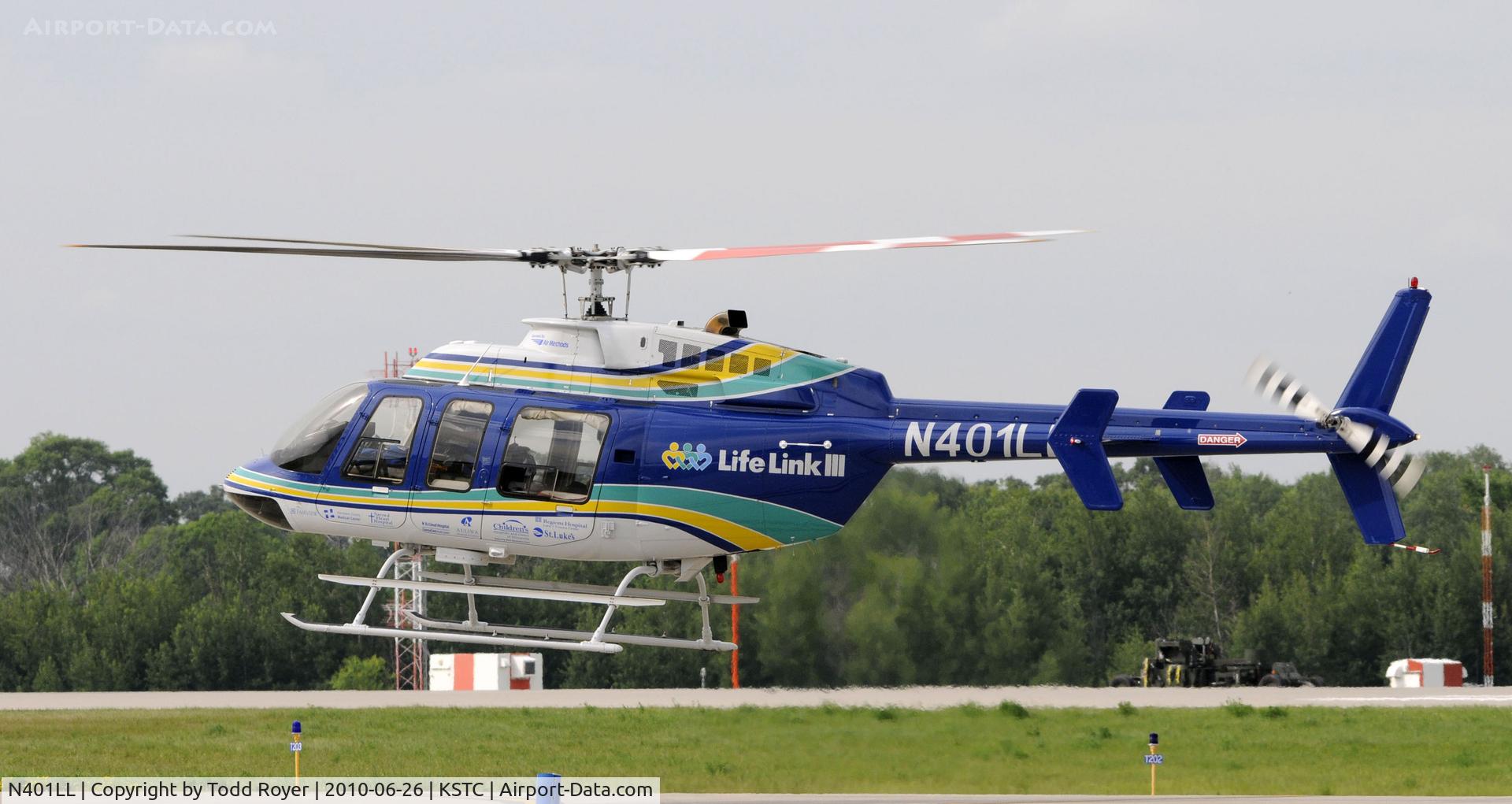 N401LL, 1997 Bell 407 C/N 53208, departing St Cloud Regional