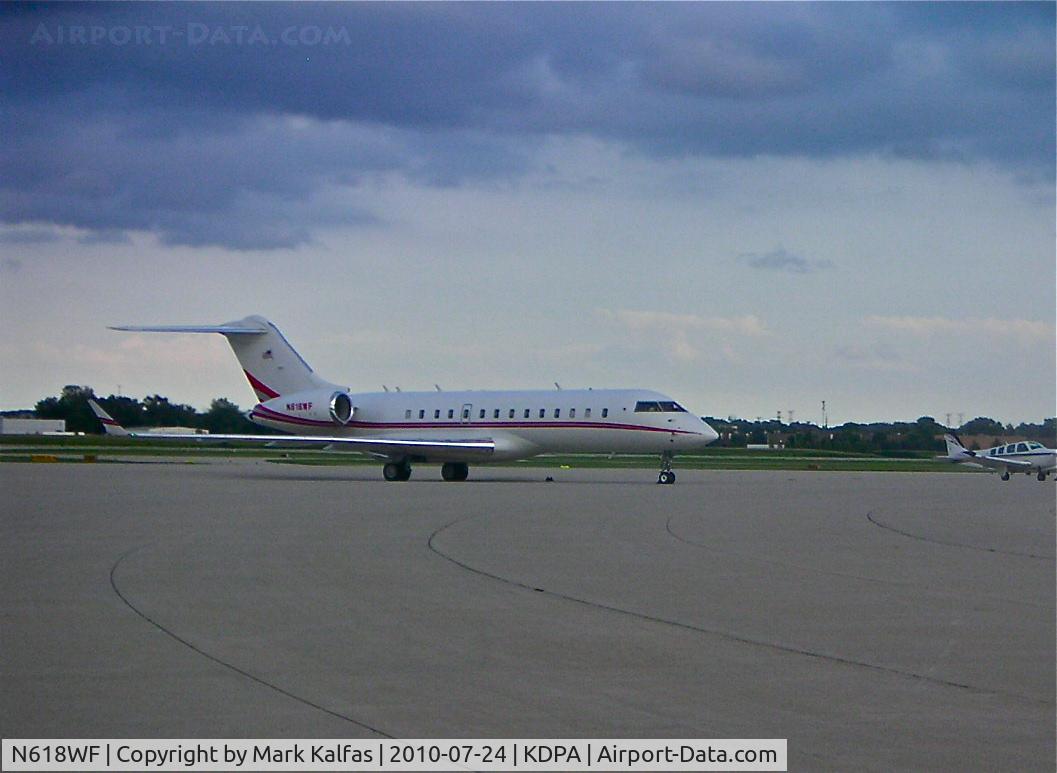 N618WF, 1999 Bombardier BD-700-1A10 Global Express C/N 9005, N618WF INC, 1999 Bombardier BD-700-1A10 on the ramp at KDPA preparing for a long overnighter to EHAM (Amsterdam Schiphol).