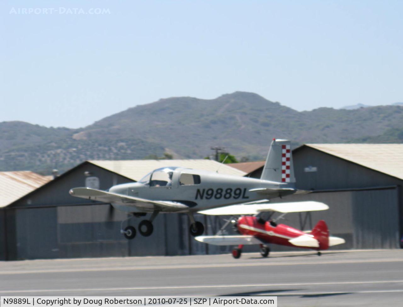 N9889L, 1975 Grumman American AA-1B Trainer C/N AA1B-0489, 1975 Grumman American AA-1B TRAINER, Lycoming O-235 108 Hp, takeoff climb Rwy 22