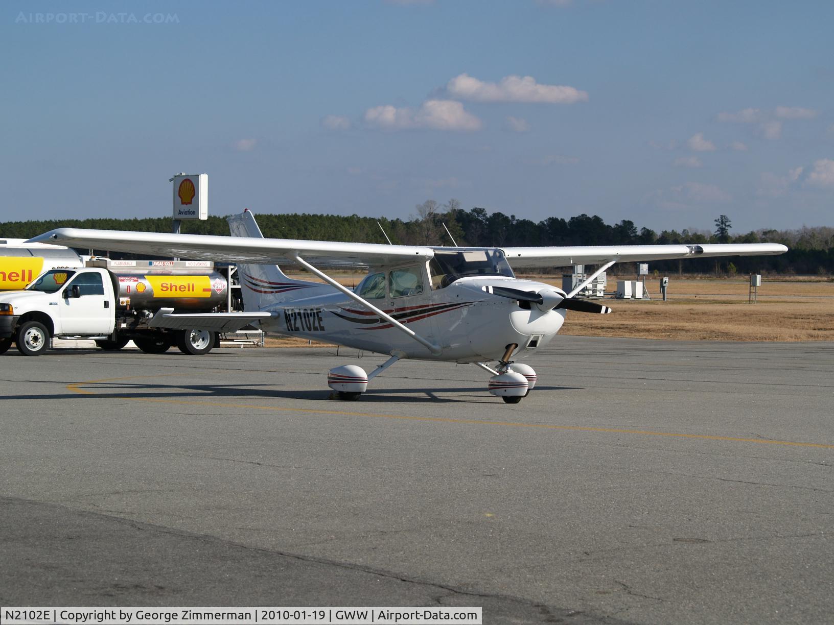 N2102E, 1978 Cessna 172N C/N 17271156, Parked on apron at Goldsboro-Wayne