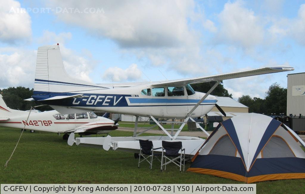 C-GFEV, 1977 Cessna A185F Skywagon 185 C/N 18503301, Cessna A185F Skywagon in the grass.