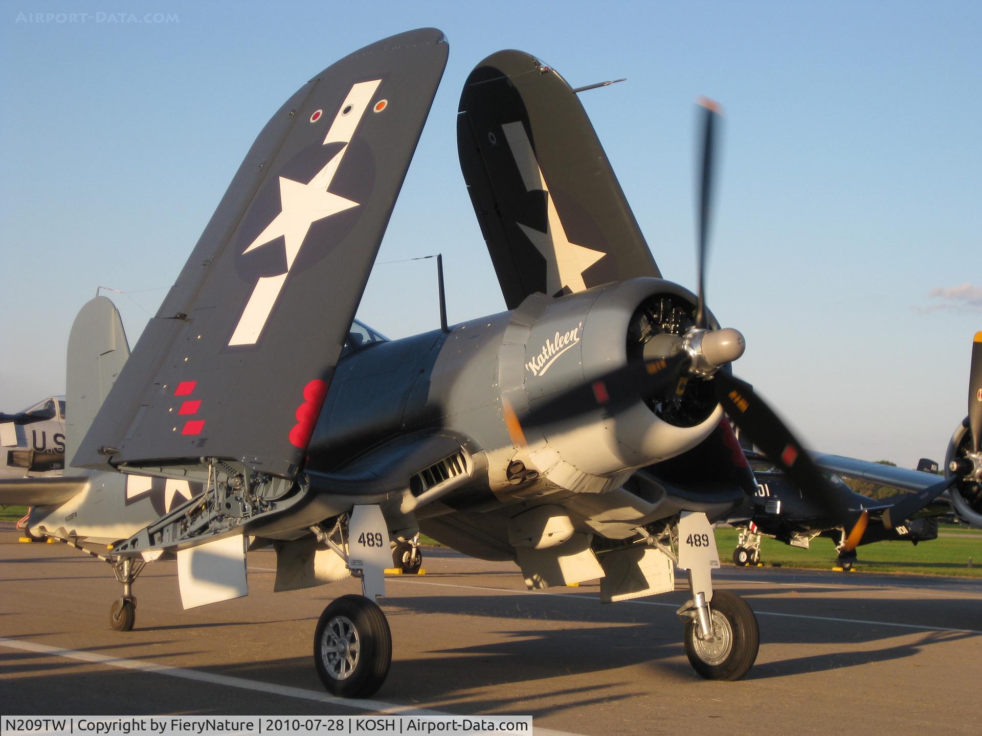 N209TW, Goodyear FG-1D Corsair C/N 3750, Arriving at AirVenture 2010.