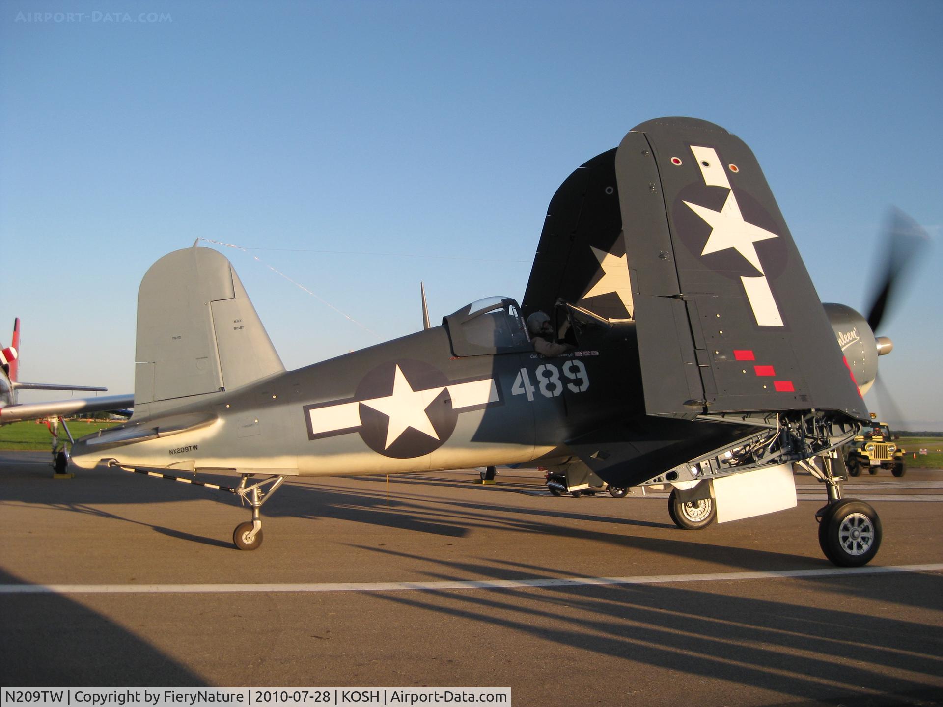N209TW, Goodyear FG-1D Corsair C/N 3750, Arriving at AirVenture 2010.