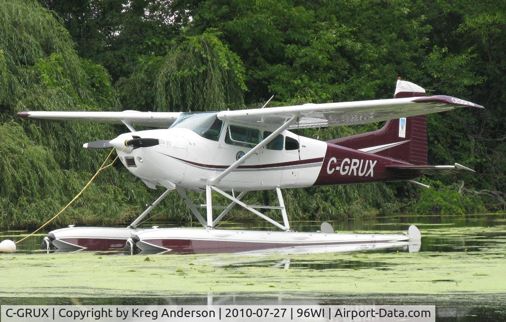 C-GRUX, 1977 Cessna 180K Skywagon C/N 18052781, Cessna 180K Skywagon moored at AirVenture 2010.