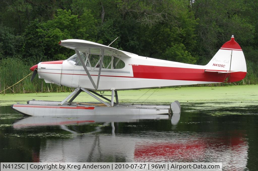 N412SC, 1946 Piper PA-12 Super Cruiser C/N 12-868, Piper PA-12 Super Cruiser moored at AirVenture 2010.