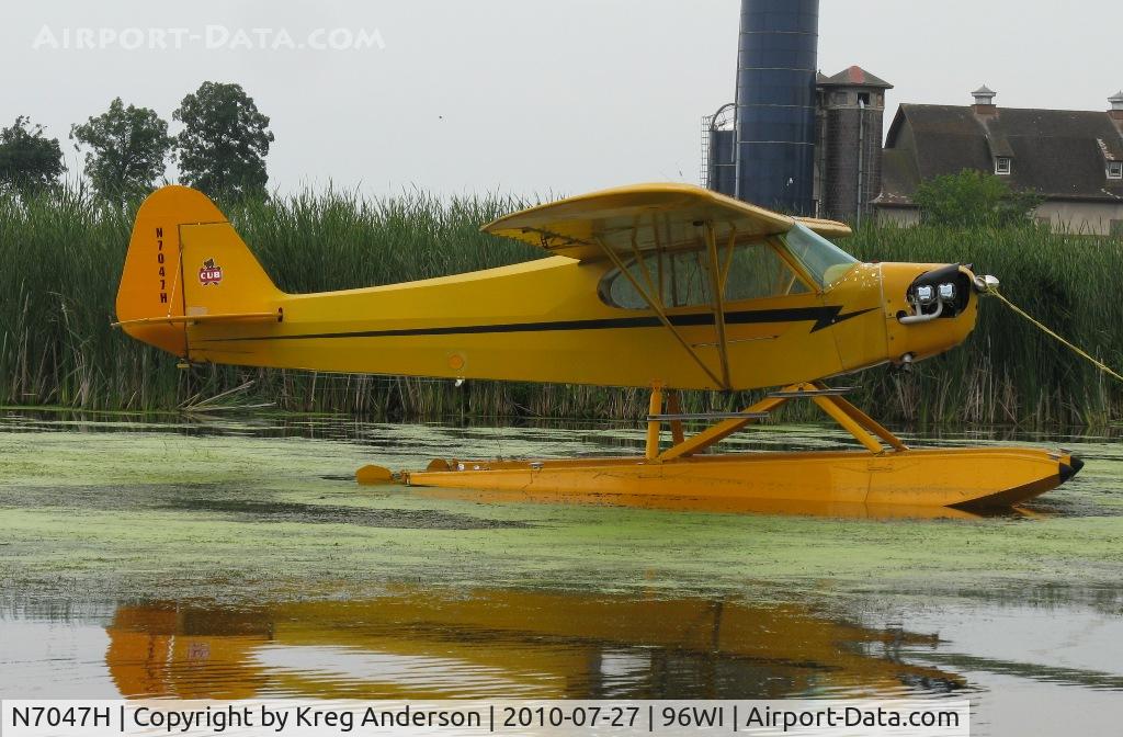 N7047H, 1946 Piper J3C-65 Cub Cub C/N 20292, Piper J3C-65 Cub moored at AirVenture 2010.