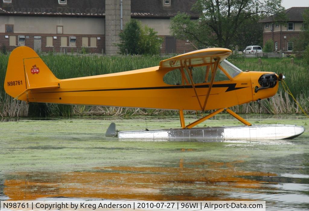 N98761, 1946 Piper J3C-65 Cub Cub C/N 18992, Piper J3C-65 Cub moored at AirVenture 2010.