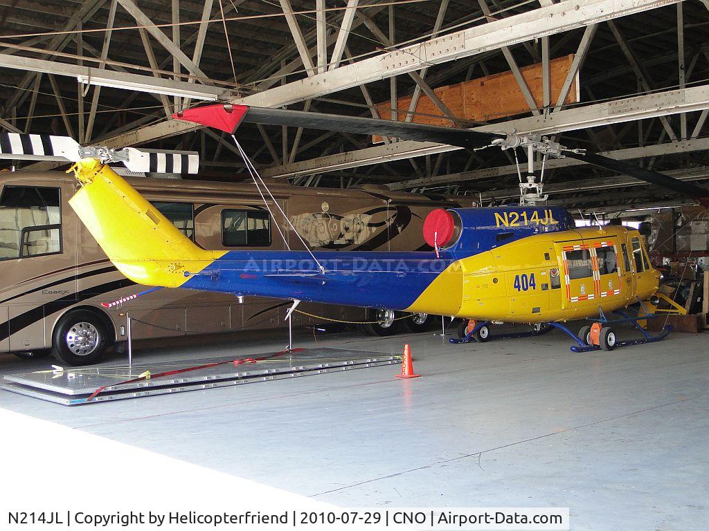 N214JL, Bell 214B-1 Biglifter C/N 28066, Tied down and parked in the hanger