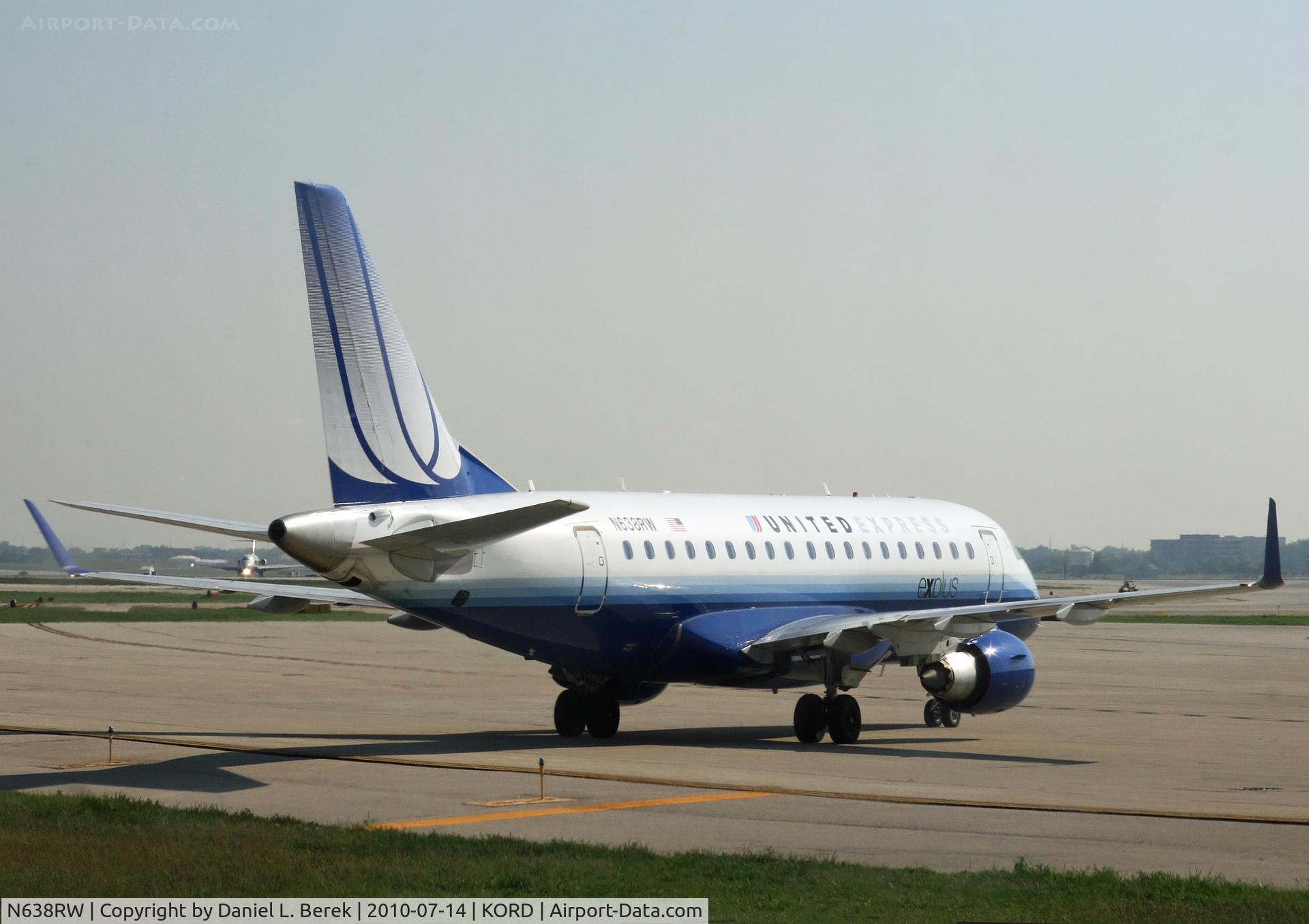 N638RW, 2004 Embraer 170SE (ERJ-170-100SE) C/N 17000053, One of United's shuttle affilate aircraft holds on the apron, awaiting instructions from the tower.