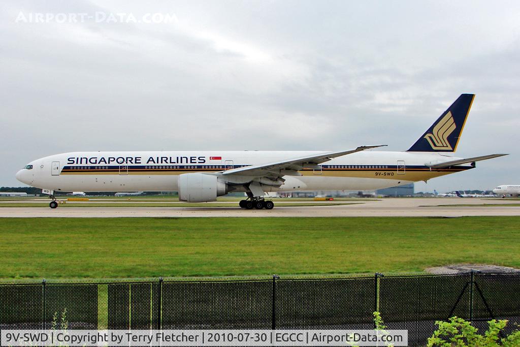 9V-SWD, 2006 Boeing 777-312/ER C/N 34569, Singapore Airlines 2006 Boeing 777-312ER, c/n: 34569 departs from Manchester UK