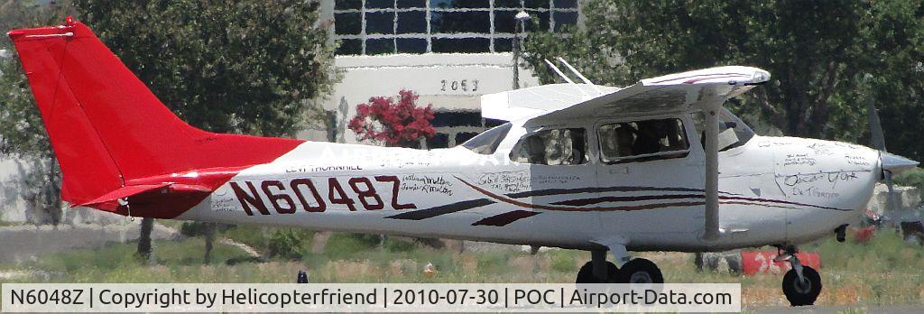 N6048Z, 2006 Cessna 172S C/N 172S10217, Appears to be a special plane. Note autographs on both sides of the ship