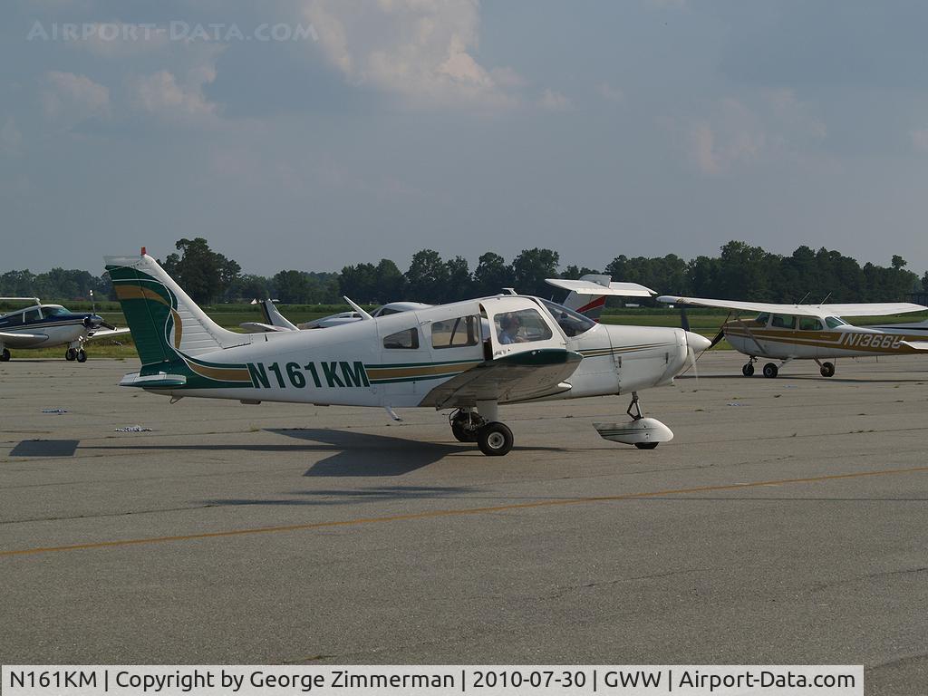 N161KM, 1977 Piper PA-28-161 C/N 28-7716136, Departure taxi for training flight @ Goldsboro-Wayne