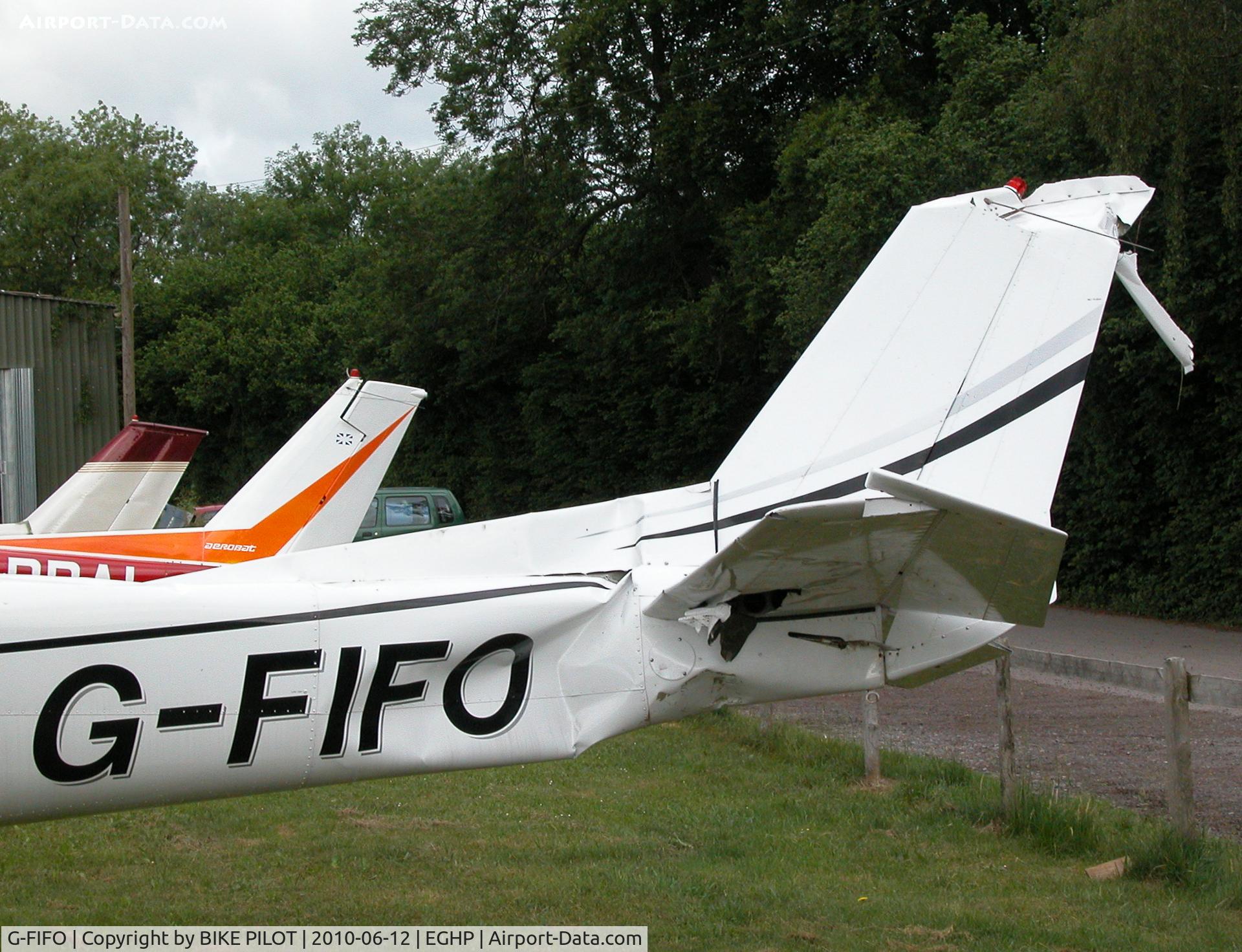 G-FIFO, 1981 Cessna 152 C/N 152-85177, DAMAGE TO RESIDENT CESSNA 152 AFTER FLIPPING OVER ON LANDING PILOT OK.