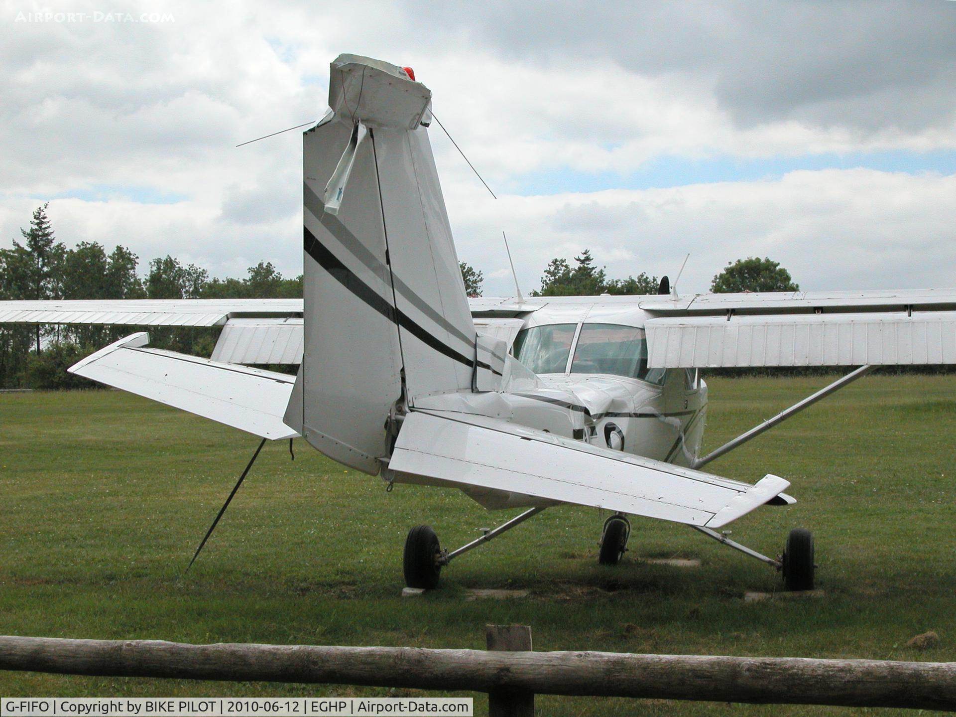 G-FIFO, 1981 Cessna 152 C/N 152-85177, DAMAGE TO RESIDENT CESSNA 152 AFTER FLIPPING OVER ON LANDING PILOT OK.