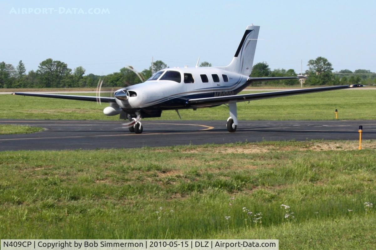N409CP, 2006 Piper PA-46-350P Malibu Mirage C/N 4636375, Departing Delaware, Ohio