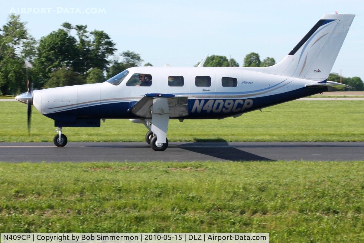 N409CP, 2006 Piper PA-46-350P Malibu Mirage C/N 4636375, Departing Delaware, Ohio